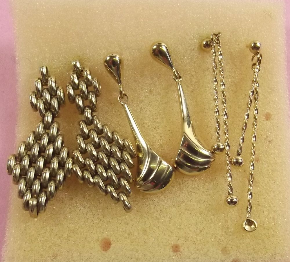 Three pairs of various gold earrings