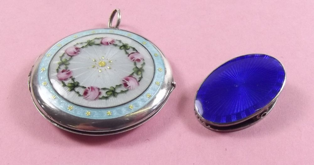 A silver and floral enamel locket - hinge a/f, and a silver and blue enamel money clip