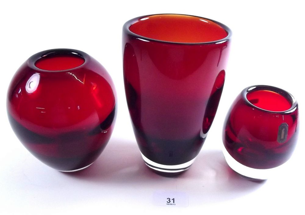 Two ovoid Whitefriars ruby vases - one with label - and another vase