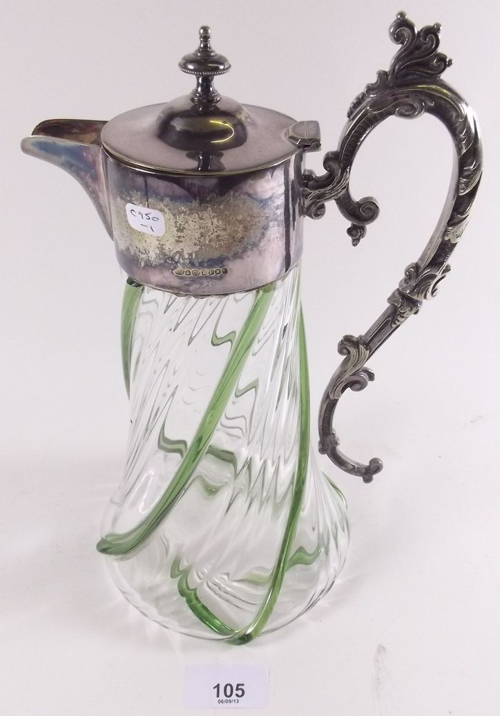A Victorian silver plated claret jug with green and clear swirled glass body