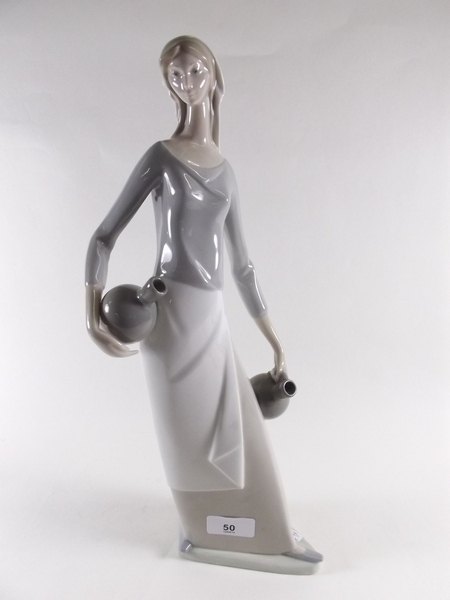 A large Lladro figure of a lady with two jugs - 13"