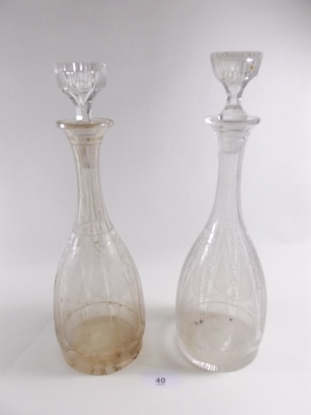 A pair of Victorian etched glass decanters