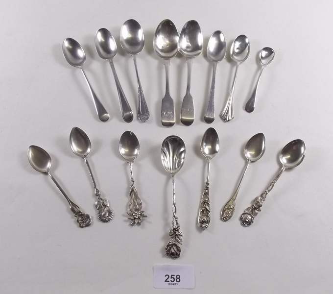 A group of silver and white metal teaspoons - total 7ozs