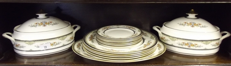 A Minton Asquith dinner service comprising: five dinner plates, two tureens and lids, meat plate and