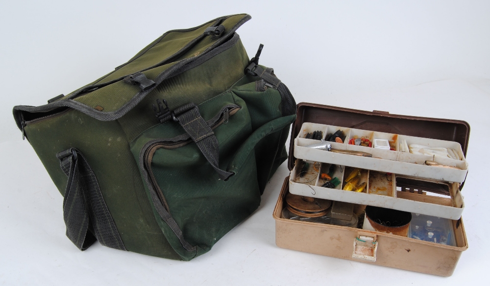 Wychwood boat bag, box of plugs, lures, spinners, hooks, etc.