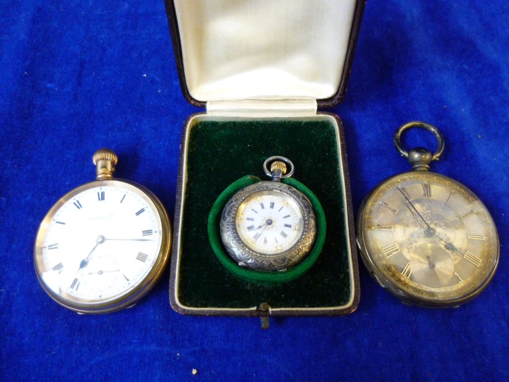 A small button wind bright cut engraved fob watch, in fitted case, also with a Thos. Russell &