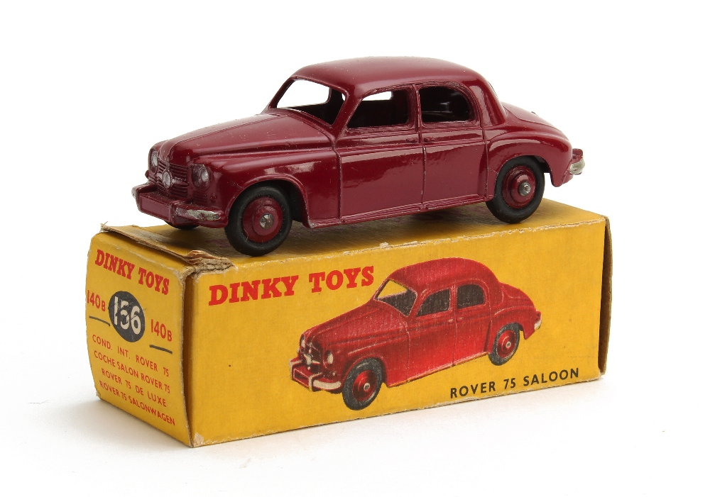 A Dinky Toys 156 Rover 75 Saloon, with maroon body and hubs, in original box, VG-E, box F-G minor