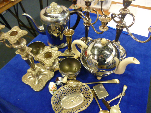 A silver plated three light candelabra, together with other silver plate and electroplated items (