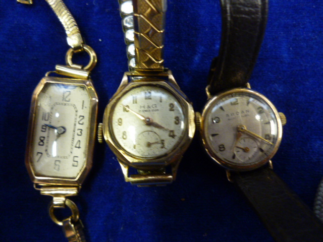 A 9ct gold Art Deco ladies watch together with a rolled gold watch and another (3)