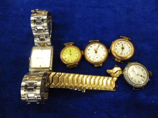Three 9ct gold wristwatches, together with a silver example and another (5)