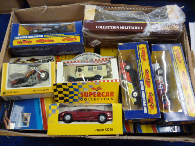 A collection of diecast by Corgi, Solido, Maisto and others, boxed.