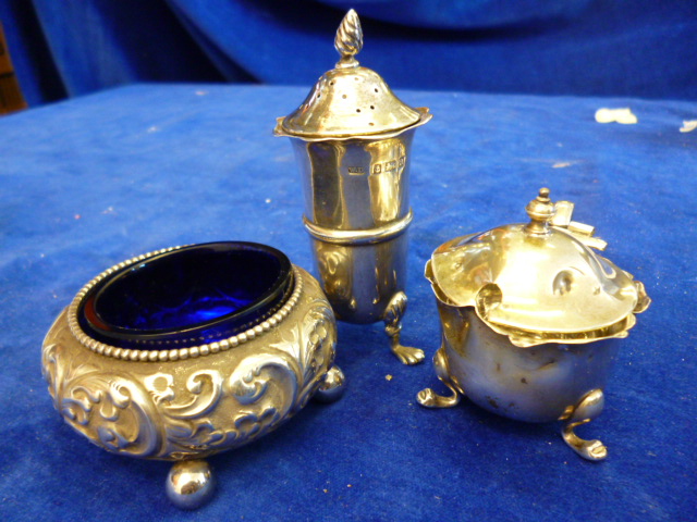 A Victorian silver salt, together with a George V Silver pepper and damaged silver mustard, 118.2g