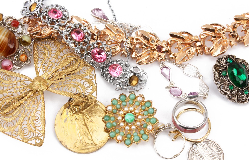 A collection of silver and costume jewellery, including several necklaces, brooches, rings, also