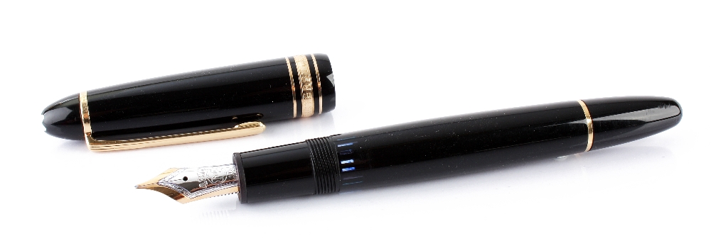 A Mont Blanc Meisterstuck 149 fountain pen, in classic black with gold trim, 15ct gold nib, lid
