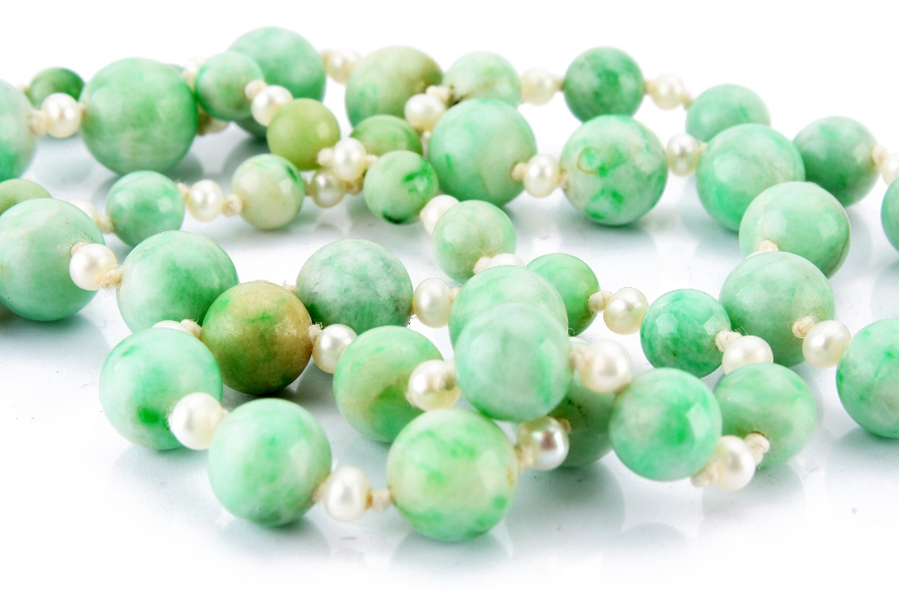 A Chinese jade bead and pearl necklace, the graduated polished round green hardstones alternately