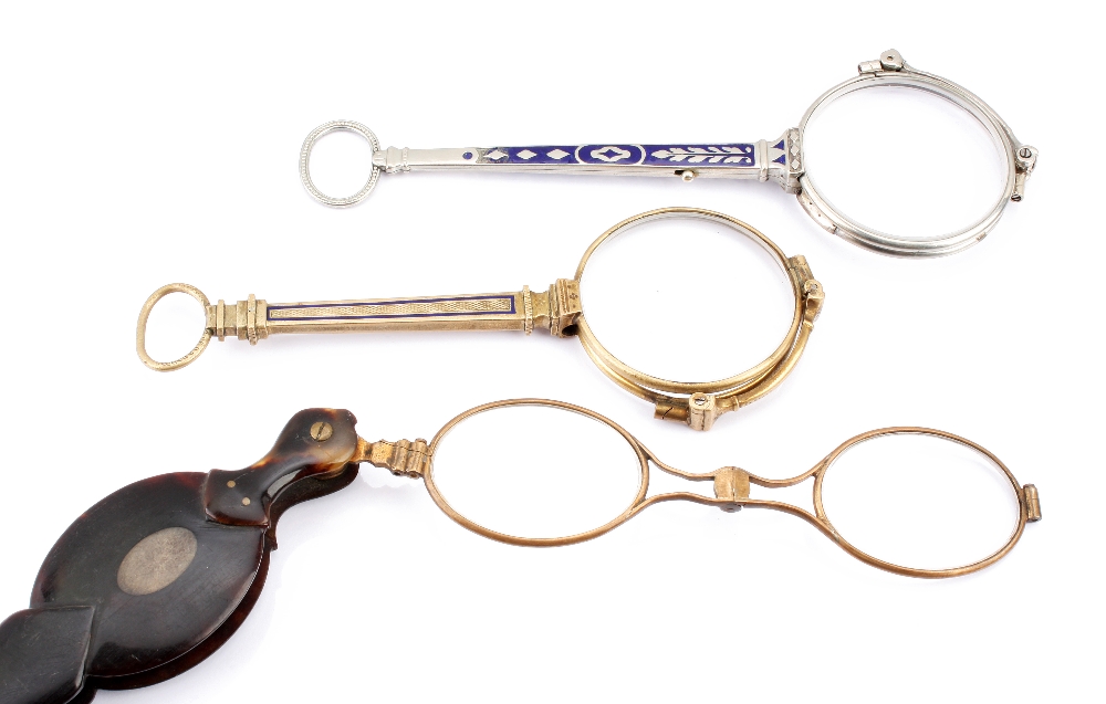 Three pairs of 19th century lorgnettes, comprising one white metal with blue enamel, one gilt also