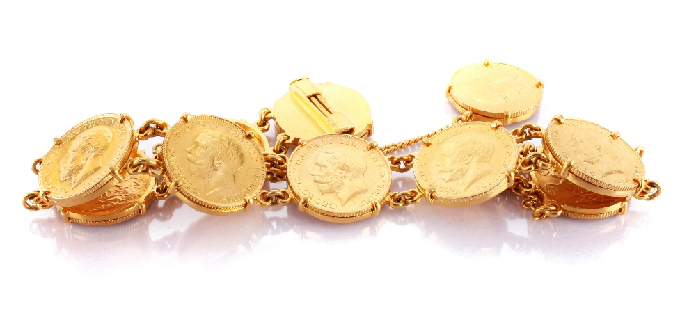 A George V half sovereign bracelet, the high carat gold mounts and chain links supporting nine
