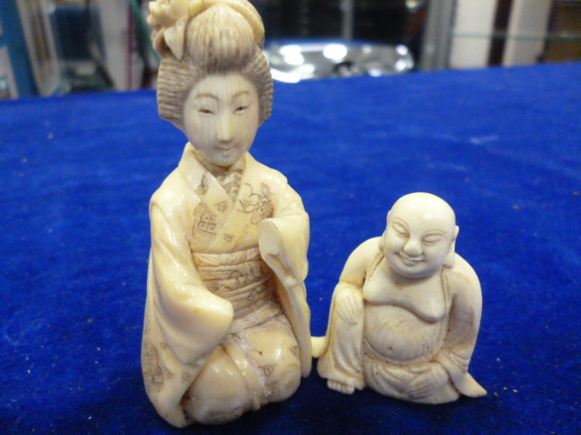 Two Japanese ivory figures, one of a Buddha and another of a kneeling lady (AF) (2) NO LIVE