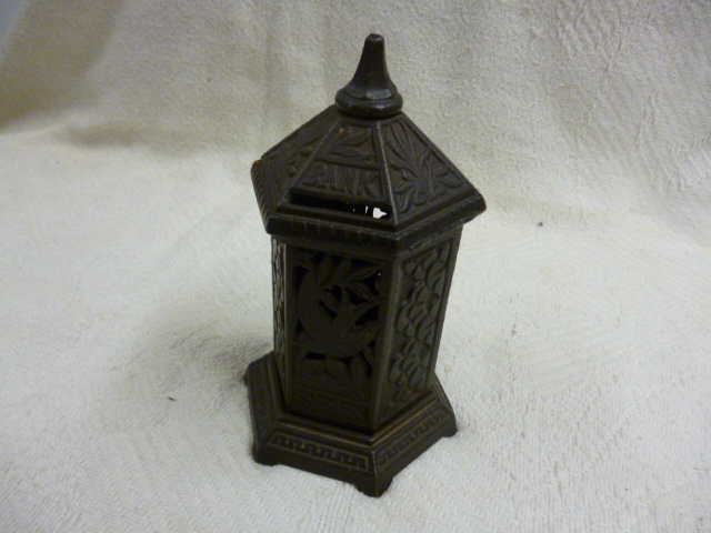 A cast iron money box in the form of a letter box NO LIVE BIDDING FOR THIS SALE