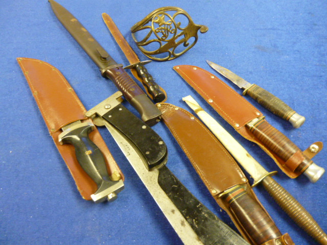 A Victorian sword basket together with a collection of 8 daggers & bayonets (9) NO LIVE BIDDING