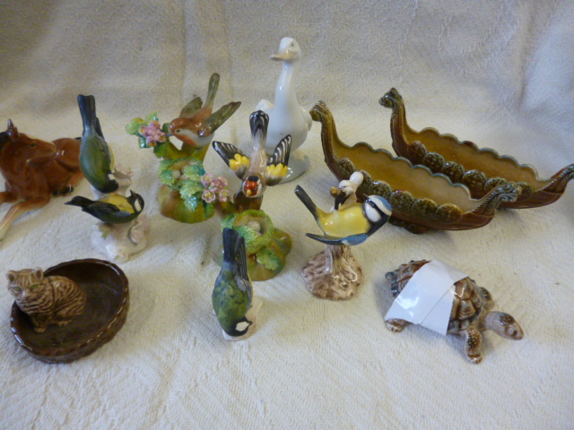 A group of collectable ceramics, including, Goebels, Wade , Nao etc NO LIVE BIDDING FOR THIS SALE