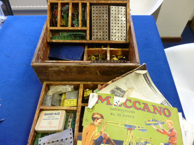 A box of various meccano items including a small collection of magazines (parcel) NO LIVE BIDDING
