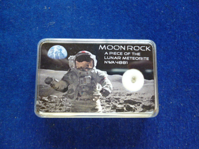 A piece of Moon rock, in presentation box, marked as a piece of lunar meteorite NO LIVE BIDDING