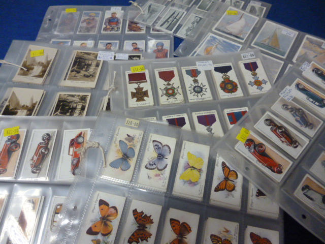 Cigarette cards, a collection of various sets and parts sets including Motor Cards, War