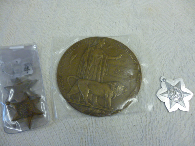 Militaria; a death plaque together with medals and blank medal cut outs NO LIVE BIDDING FOR THIS
