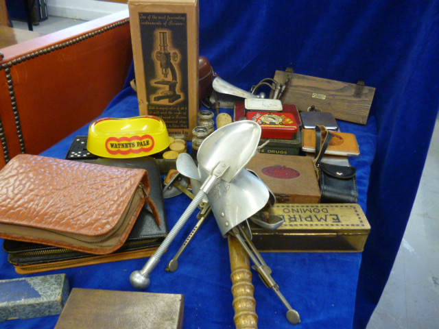 A group of items including advertising tins, a truncheon, shoe keepers, cigarette cases etc NO