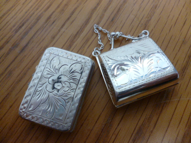 Two silver pill boxes including one in the shape of a handbag (2) NO LIVE BIDDING FOR THIS SALE