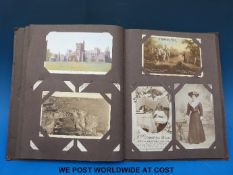 A postcard album of Edwardian examples approx 115 in all, including glamour, WWI, children's