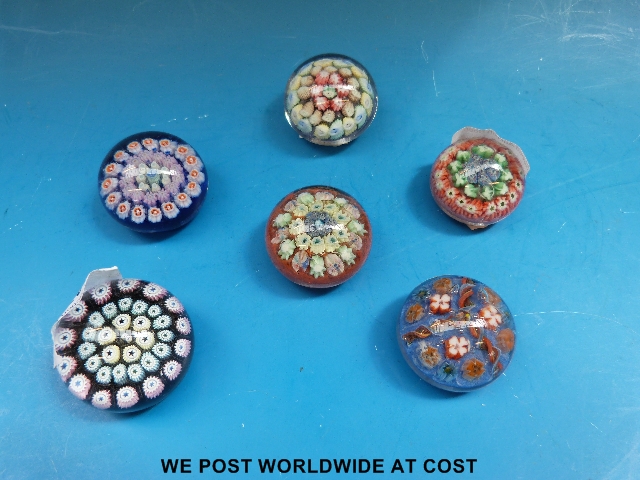 Six miniature paperweights