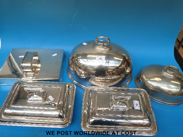 An Asprey silver plated serving cover together with a quantity of other silver plated serving dishes