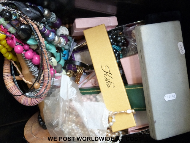 A box of costume jewellery, mostly necklaces, including pearl