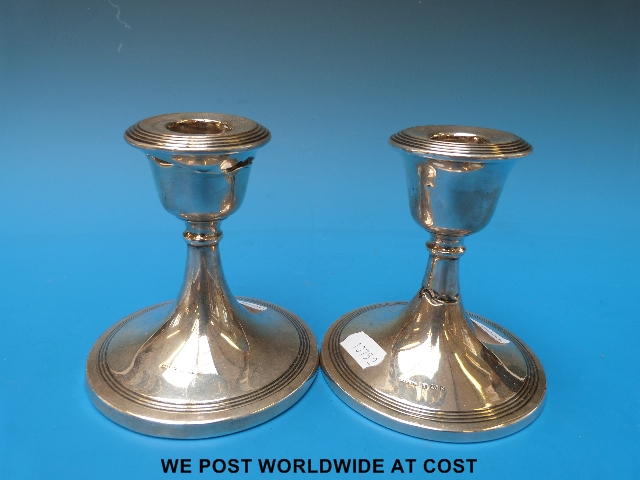 Pair of silver candlesticks (B'ham 1917).