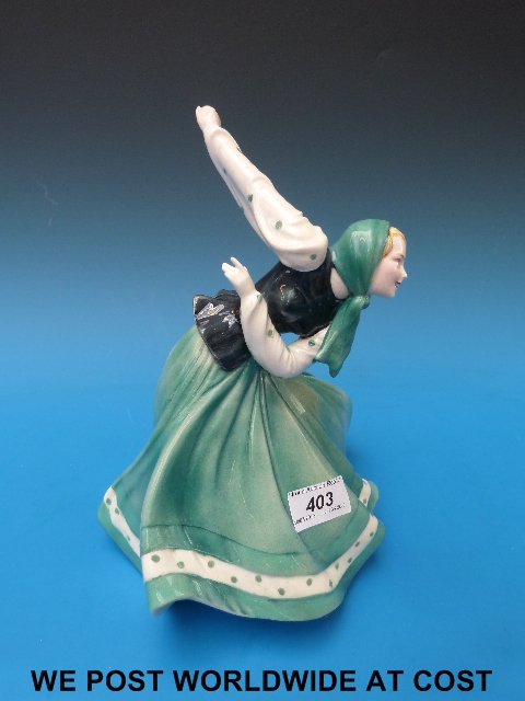 A German Hertwig & Co Katzhutte porcelain ice skater figure with green printed mark (25cm/10in