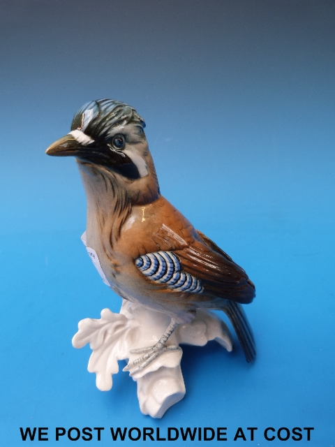 A Karl Ens figure of a jay with blue windmill mark (16cm/6.5in high)