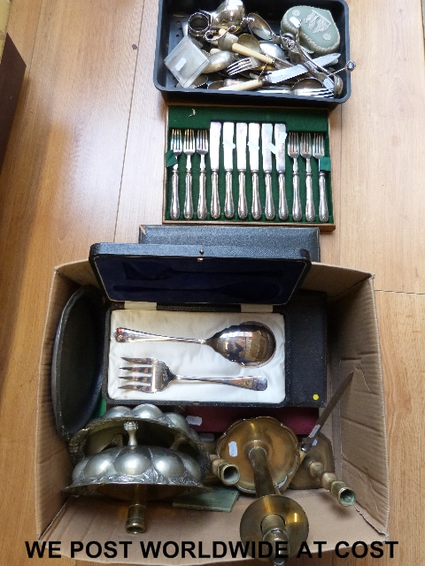 A box of silver plate, including baskets of cutlery, brass etc