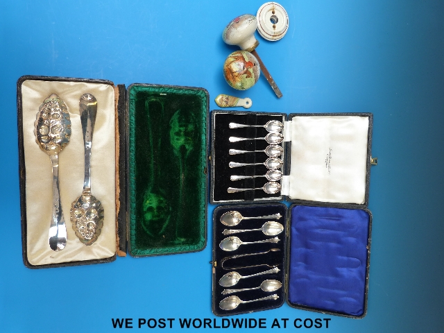 Cased continental white metal berry spoons, silver spoons, tongs, (hunting interest) door knobs etc