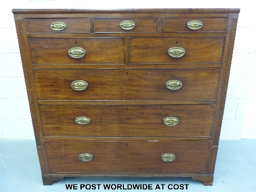 A large Georgian mahogany chest of eight drawers (three small over two over three long) oak lined