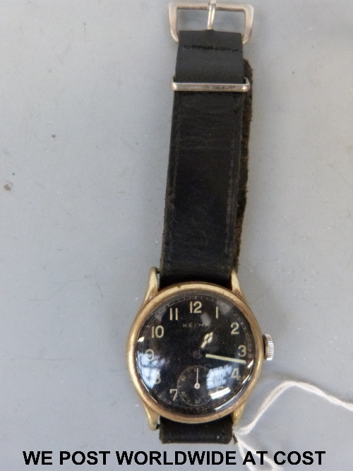 Helma German WWII wristwatch, brass case with screw back AS 1130 movement black dial, sub seconds at