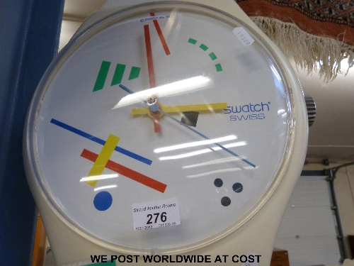 A Maxi Swatch wallclock original design, purchased in 1987, together with original documentation
