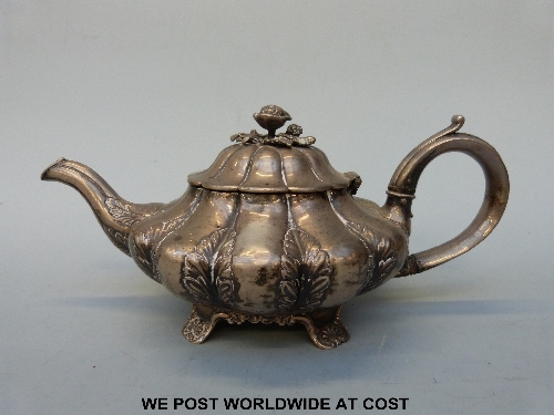 Georgian silver lobed teapot with rose finial, Ldn 1810, makers mark rubbed. 680 grams approx.