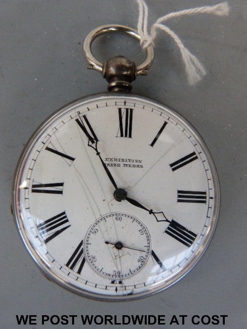 Silver cased watch 'Exhibition Prize medal' key wound and set white dial with Roman numerals and sub