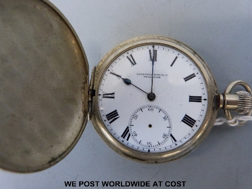 A Swiss gentleman's pocket watch in a full hunter case, white metal, having enamelled dial inscribed