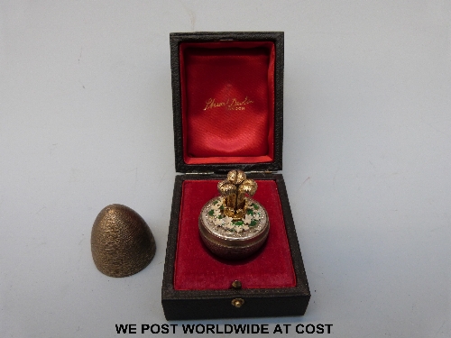 A Stuart Devlin silver gilt and enamel Charles and Diana commemorative egg, opening to reveal and