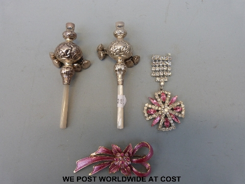 Two babies rattles and whistles with mother of pearl handles (marked 925) together with costume