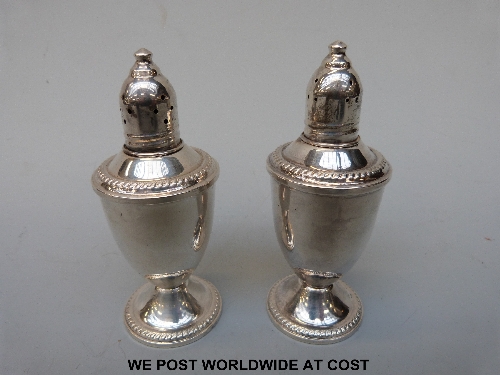 Sterling silver salt and pepper pots height 12cm