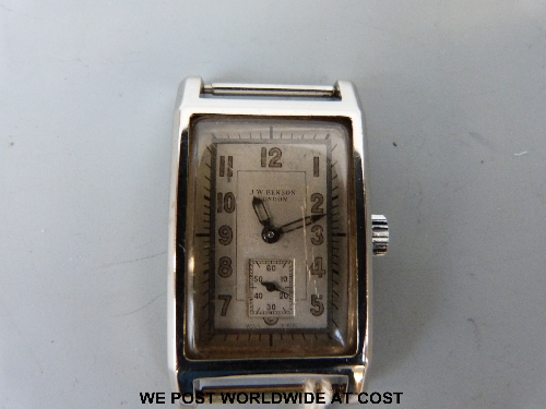 J W Benson wristwatch, rectangular chrome case and back, silver dial with luminous numerals, overall